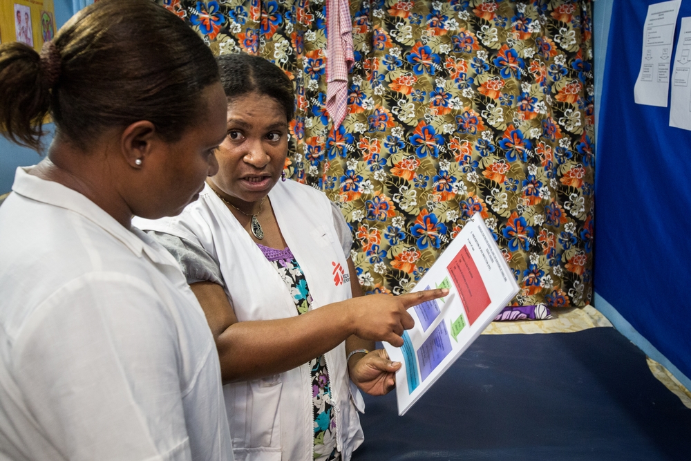 MSF Clinical Supervisor Martha Pogo provides training to a department of health nurse in Papua New Guinea.