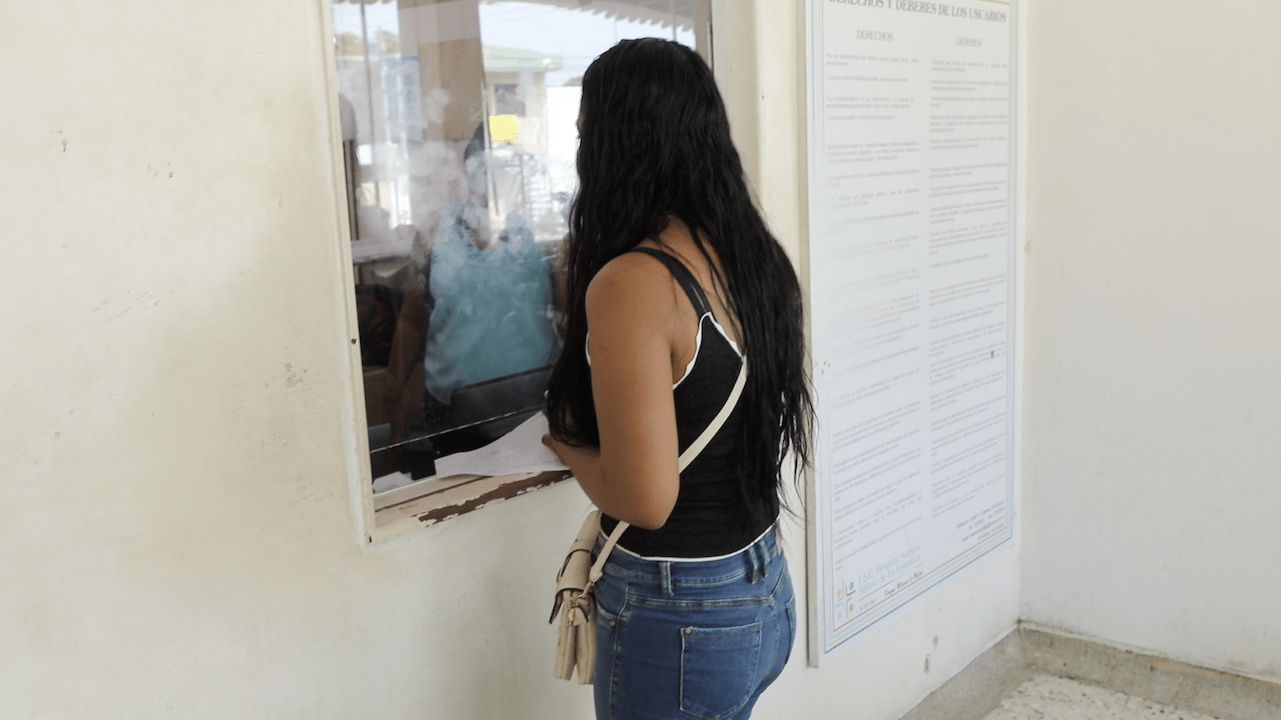 A woman waits to receive health care at Riohacha hospital in La Guajira department, Colombia.