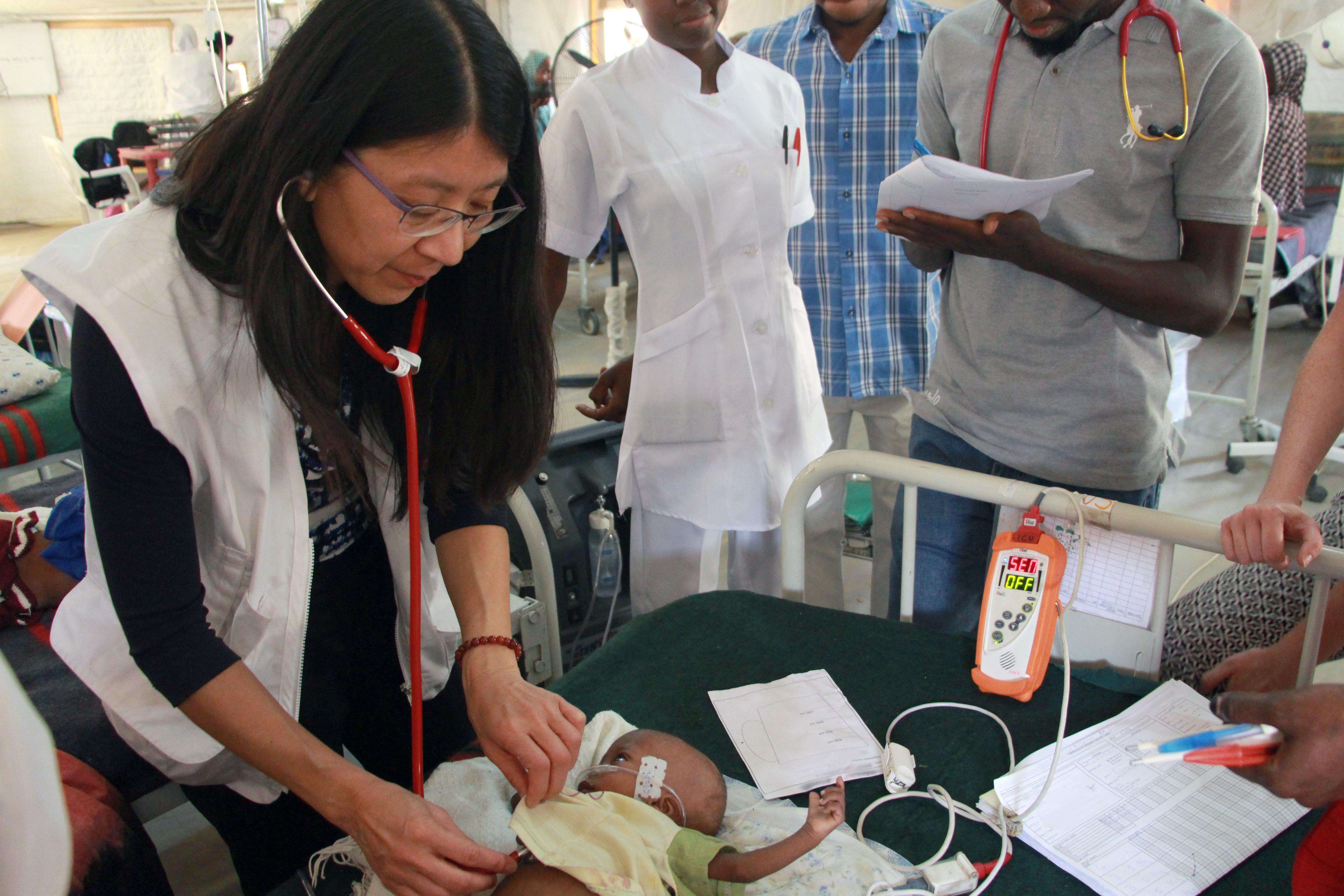 Dr. Joanne Liu caring for a child in Nigeria