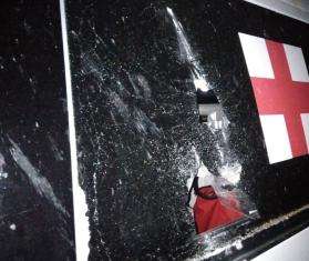 The partially shattered glass window of an MSF ambulance in Selydove.